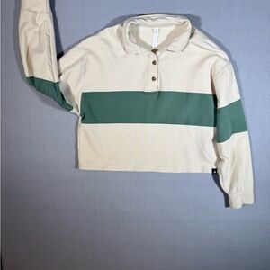 Glyder Lounge Skimmer Polo in Oatmilk and Sage stripes.